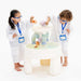 Two kids exploring STEM water play with the Smol Curiosity Water Table