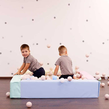 soft play ball pit boys playing