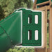 Spiral tube slide in green attached to a playset