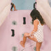 Sunny Splash Water Slide with girl climbing the wall