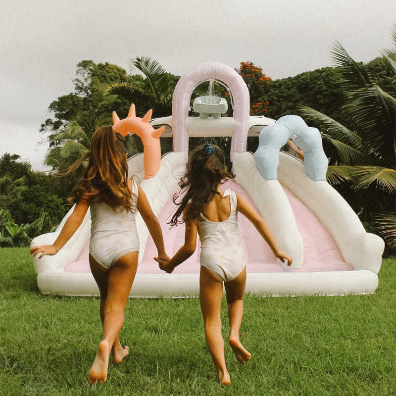 Sunny Splash Water Slide with girls running to play