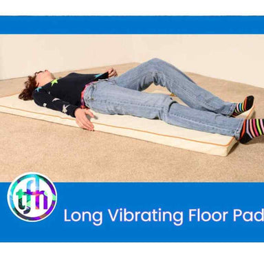 TFH Vibrating Floor Pad - Long with adult lying on sensory vibration mat