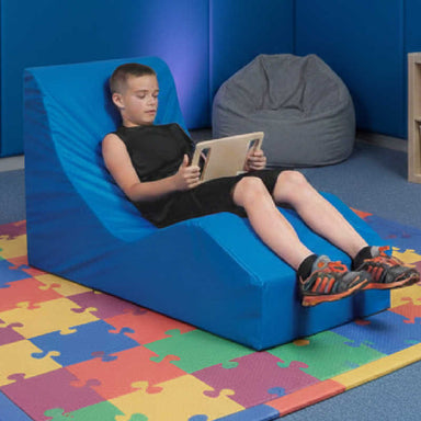 Relaxer chair with a boy in a relaxer chair