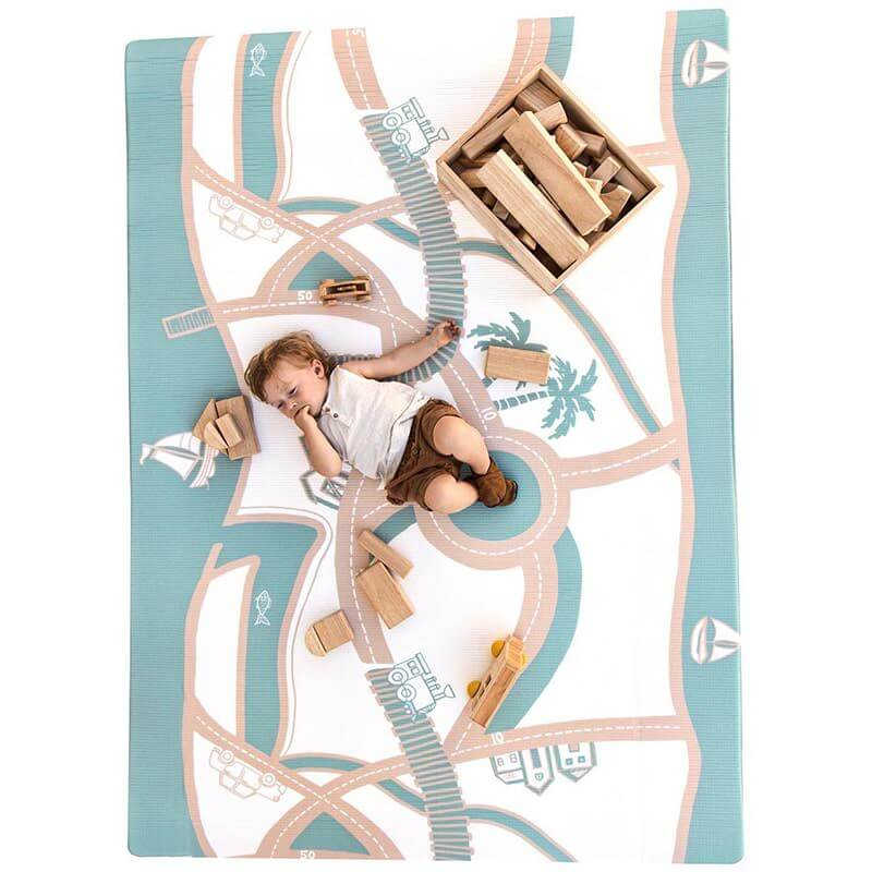 The August Rose Sand Shwally Playmat backside with kids 