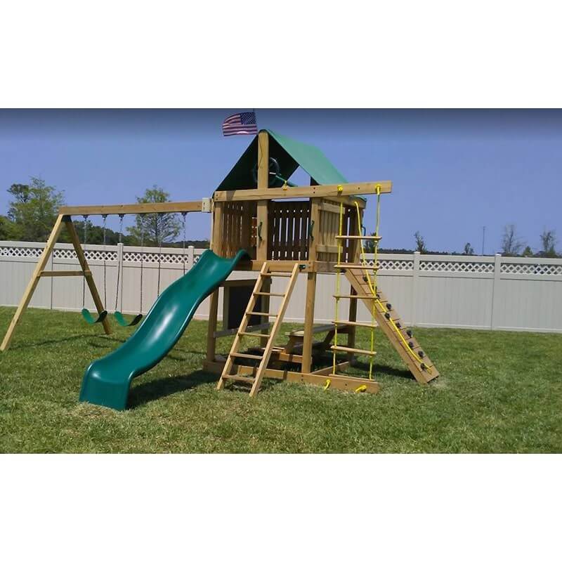 The SwingSet Co. Premier Swing Set Outdoor Near White Fence