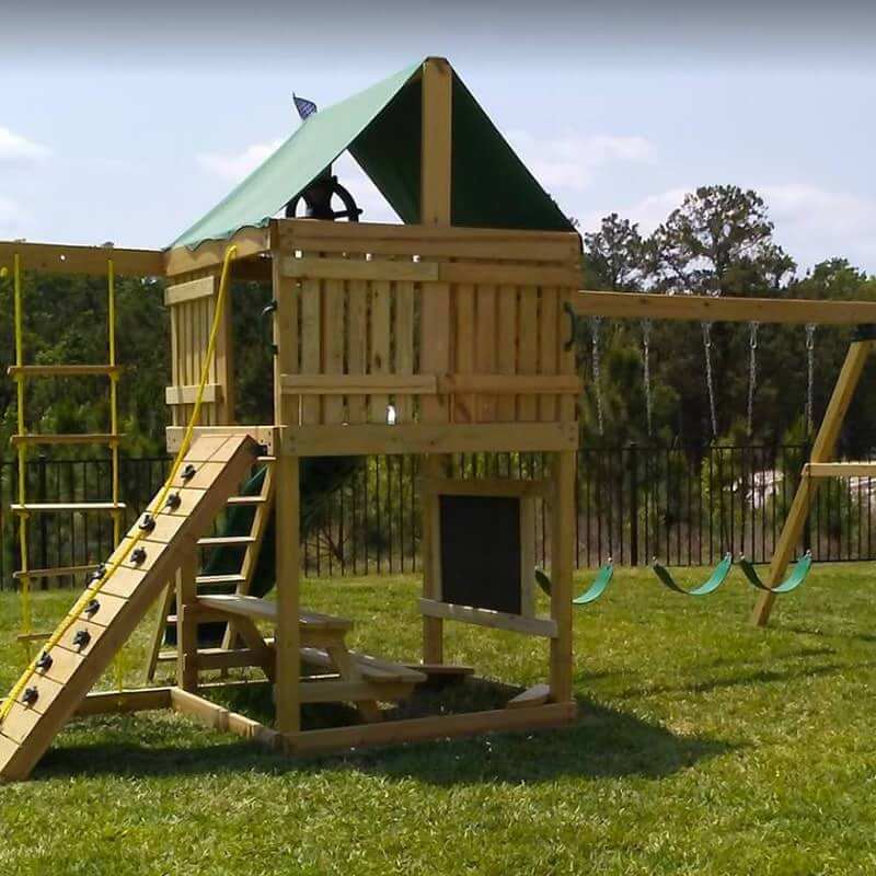 The SwingSet Co. Summit Swing Set Rear View Lifestyle Outdoor