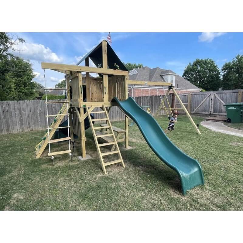 The SwingSet Co. Ultimate Swing Set Lifestyle Front Right Side View Angled Outdoor