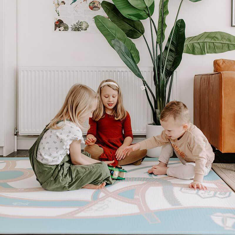 The Josephine Shwally Playmat - Double Sided with kids playing 