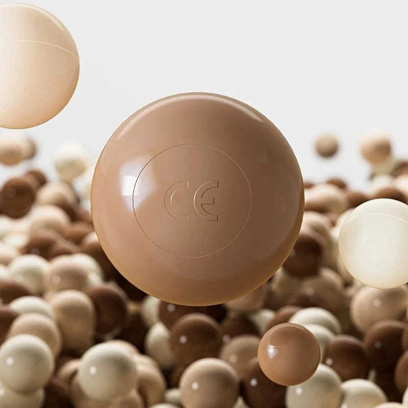 Tiny Land Ocean Ball Pit Balls up close with logo