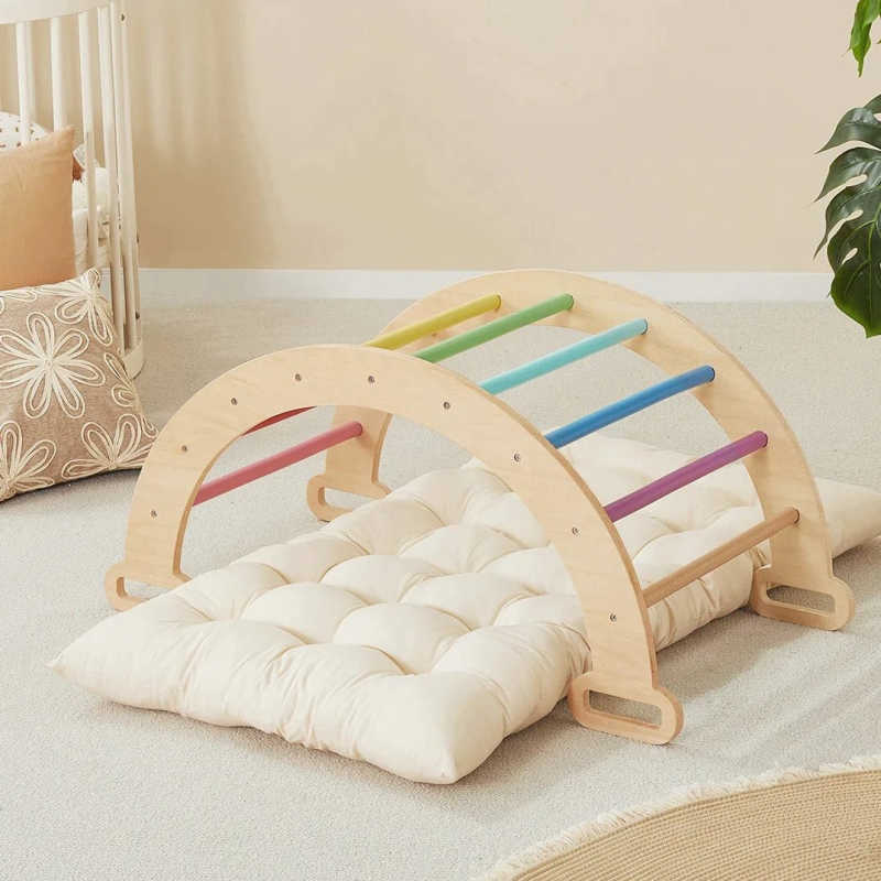 Tiny Land CLimber with rainbow colors and pillow