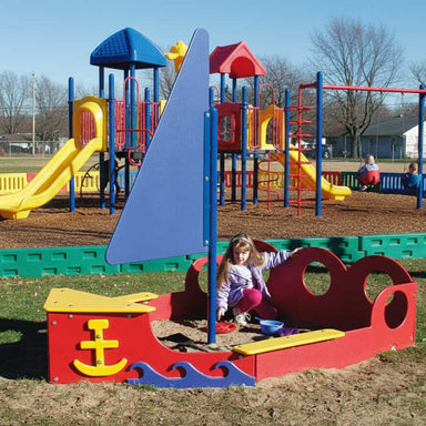 Tot Town sailboat sandbox at a preschool 