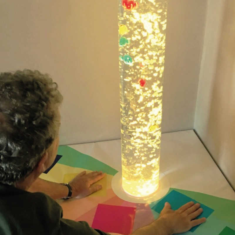 touch a color podium with a bubble tube and kid 