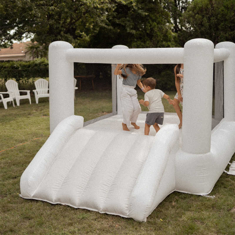 Smol Tumble Bounce house outside in a yard