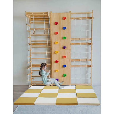 Avenlur Walnut Climber mat under the Avenlur Walnut with girl playing