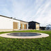 acon_air_14ft_round_trampoline_with_standard_net_package_on_the_backyard