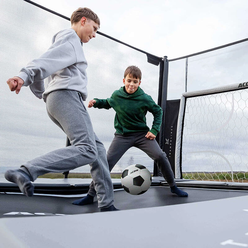 Acon X Soccer goal panel for trampoline with kids playing