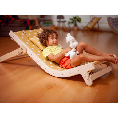 adjustable_lounge_chair_for_kids_with_comfy_pad_for_kids_kidodido_boy_playing