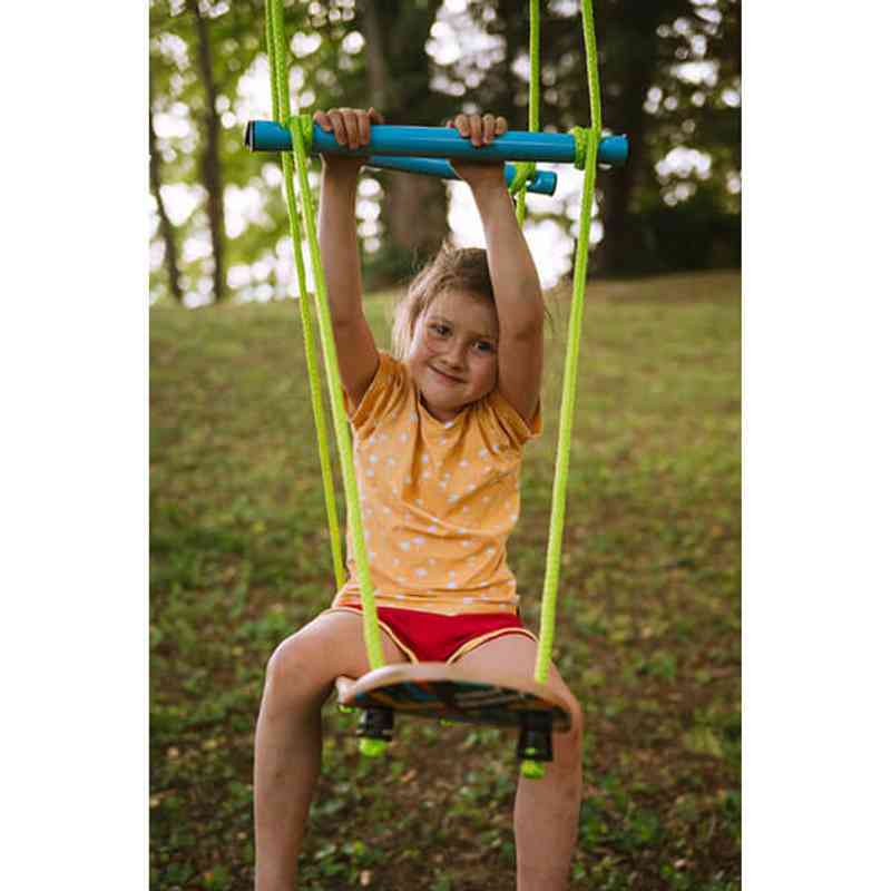 Boy playing on the Adventure Sports Skate Swing
