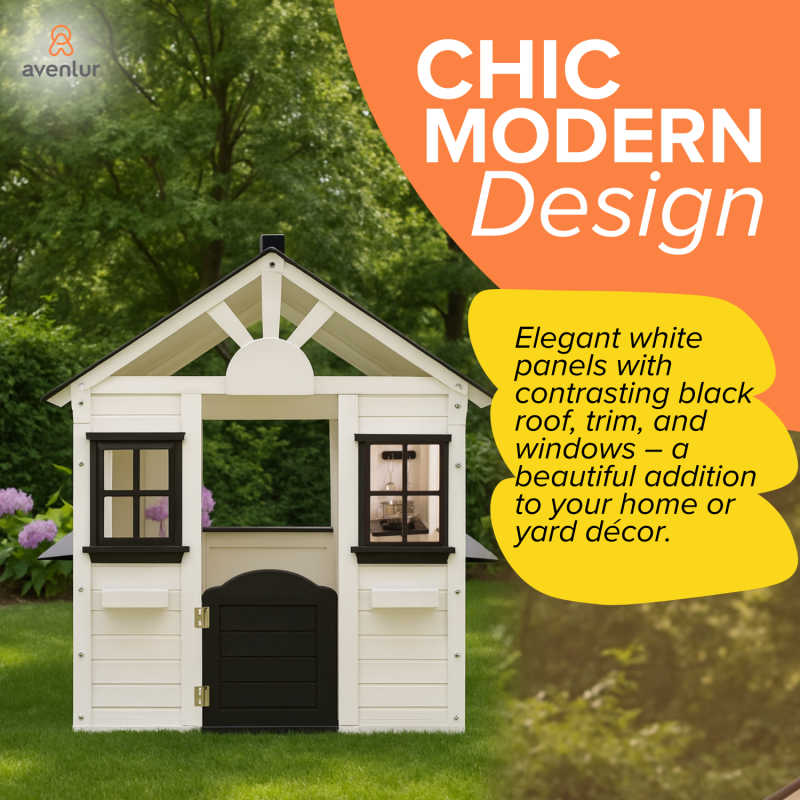 black and white wooden playhouse in a yard 