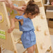 Child using Avenlur Cherry 5 in 1 indoor climber for active play