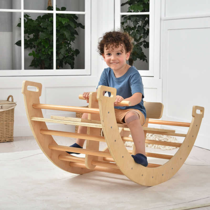 Avenlur Bailis Climbing Arch and Rocker in a home playroom for balance and gross motor play