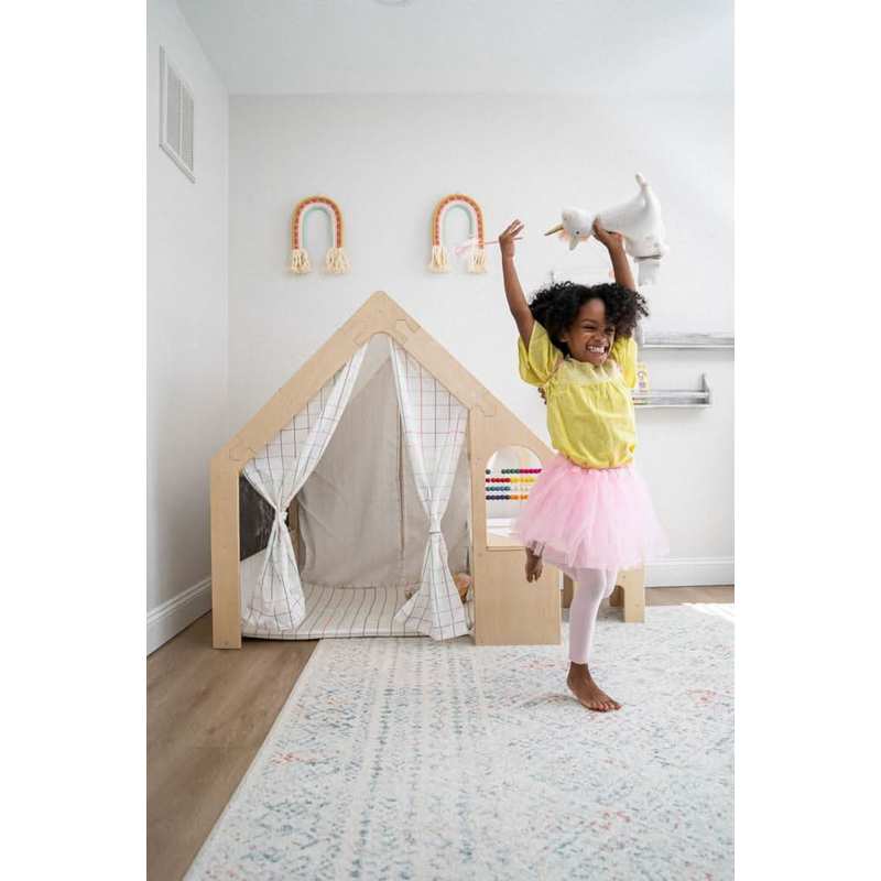 Flair | Playhouse & Sensory Desk - Colorful – child using the desk