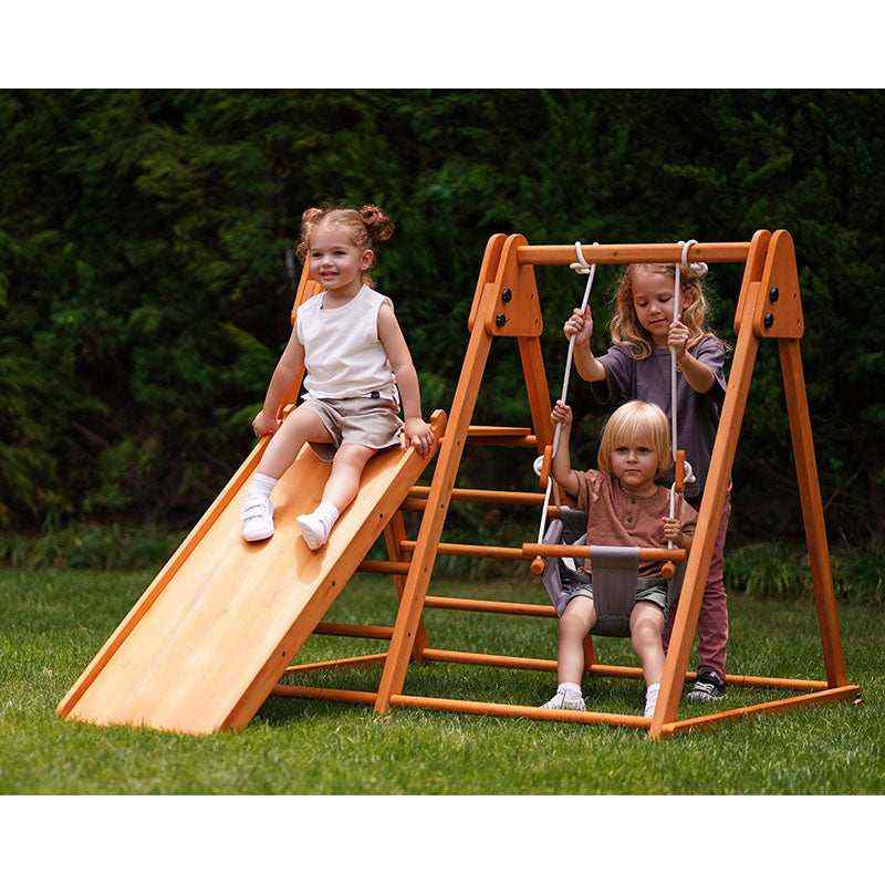 Avenlur Juniper Folding Indoor Outdoor Playset – kids using the slide outdoors