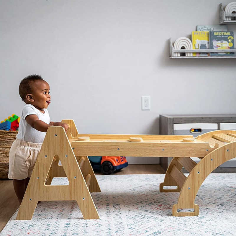 Maple Beginner Pikler Triangle and Rocker with a happy baby