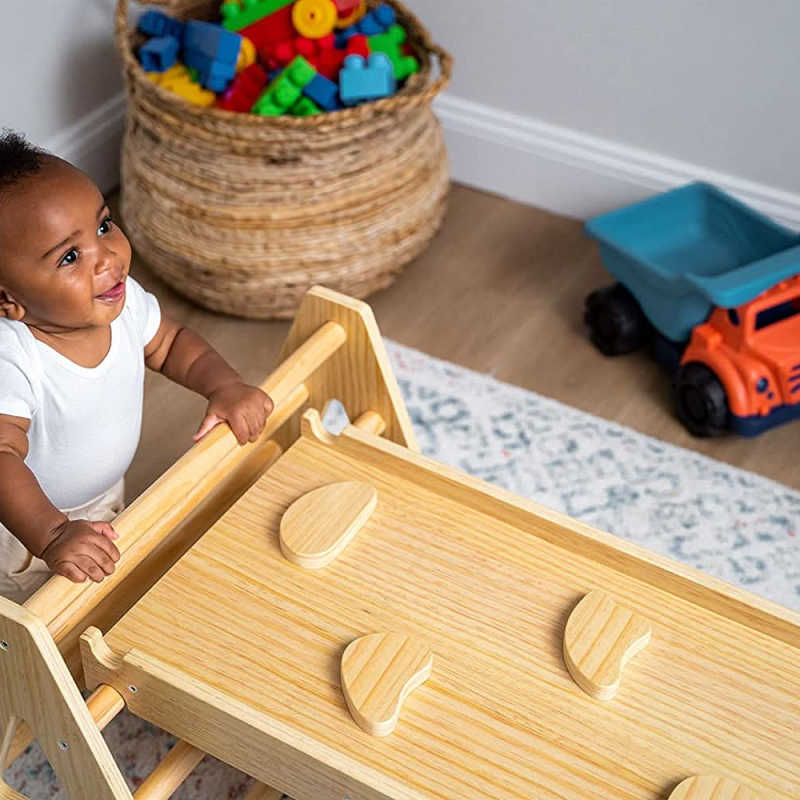 Maple Beginner Pikler Triangle and Rocker with a baby looking up