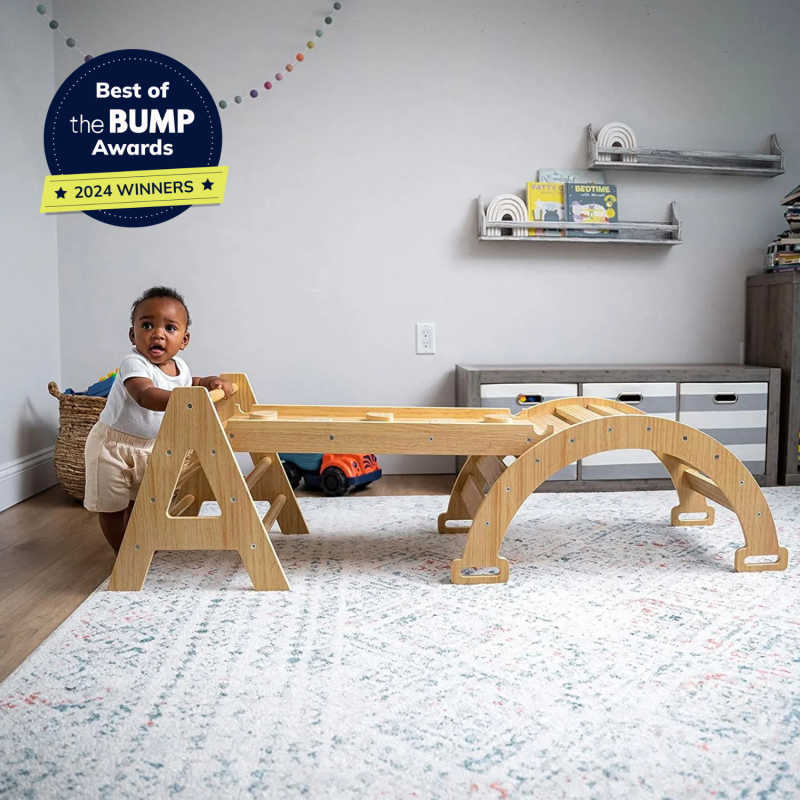 Maple Beginner Pikler Triangle and Rocker with a baby n a playroom