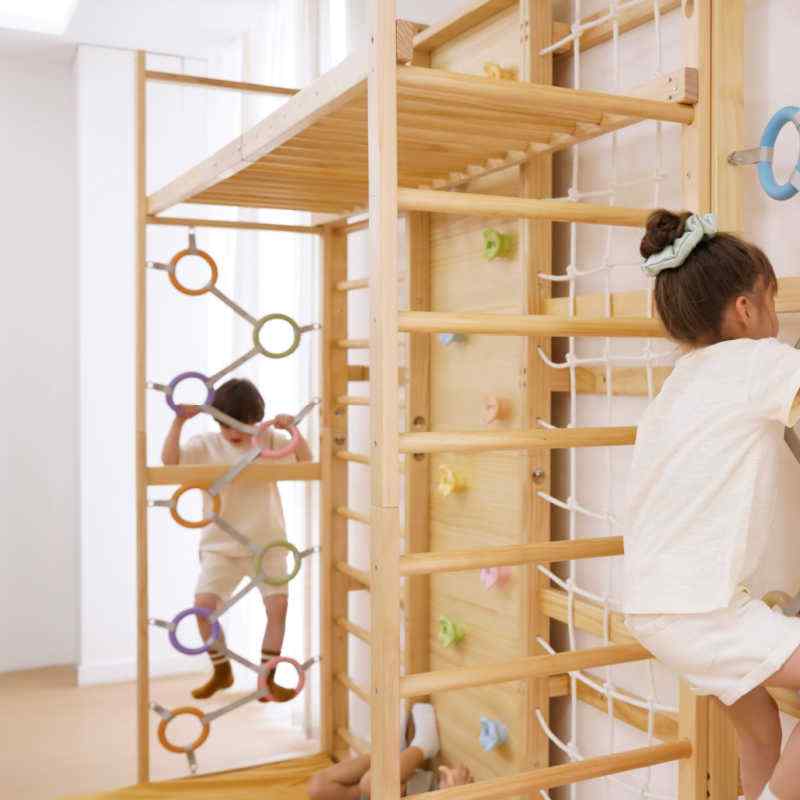 Avenlur Modular Walnut Swedish Ladder with monkey bars for supervised indoor climbing