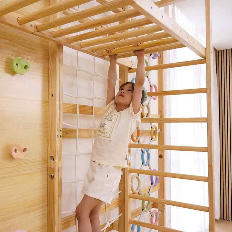 Monkey Bar Attachment – For 79 Inch Walnut Swedish Ladder with a girl playing 