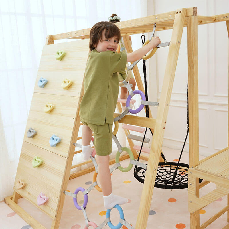 Full view of the Avenlur Sweetgum XL indoor sensory playset with slide, ladder, monkey bars, and swing
