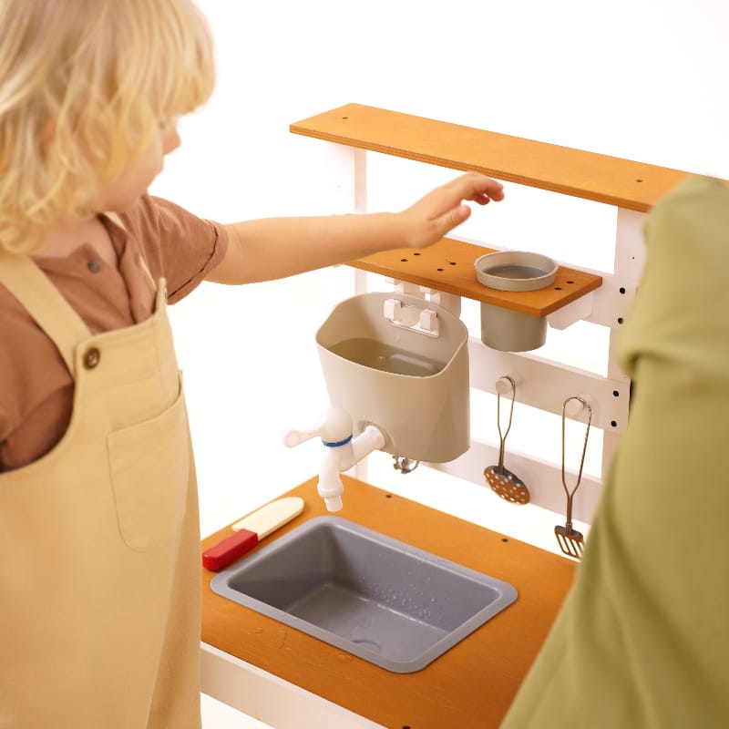 Avenlur Woodland Mud Kitchen  with kid playing 