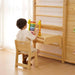 Avenlur 9-in-1 Swedish Ladder Wall Gym Child Doing Activity While Sitting