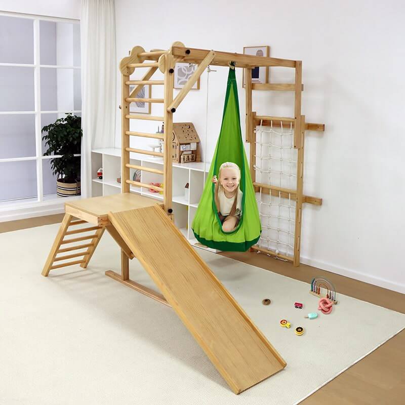Avenlur Indoor Sensory Hammock Tear Green Hanging on a Wooden Play Set