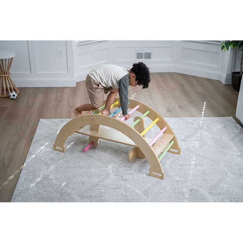 bazel_pikler_triangle_6_in_1_climber_with_rocker_arch_and_slide_set_boy_climbing