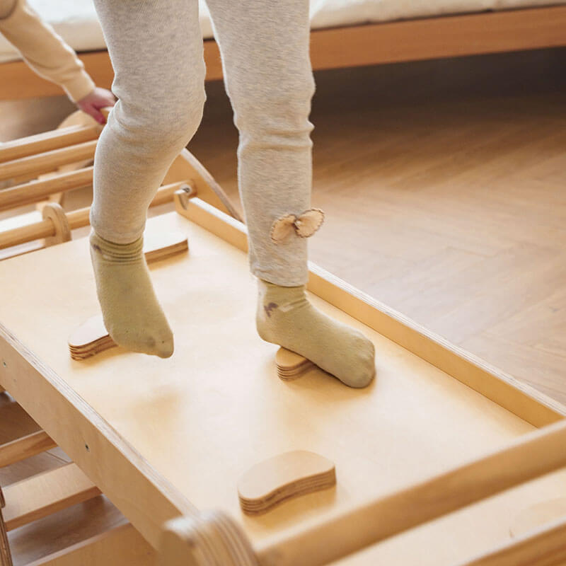 bazel_climbing_toy_with_rocker_arch_and_slide_set_closed_up_bridge