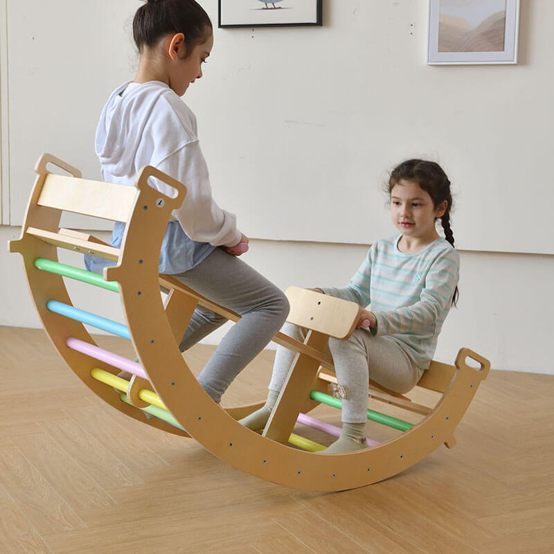 bazel_pikler_6_in_1_climber_with_rocker_arch_and_slide_set_kids_playing