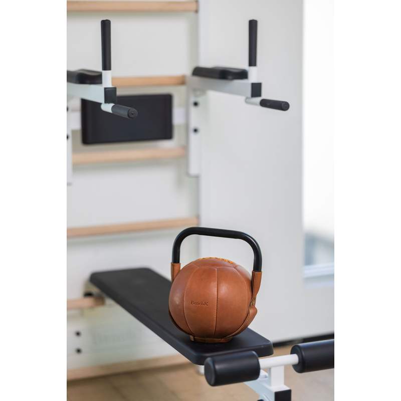 BenchK Leather Kettlebell – leather kettlebell beside training equipment