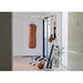 BenchK Leather Punching Bag – brown leather punching bag mounted in a home gym