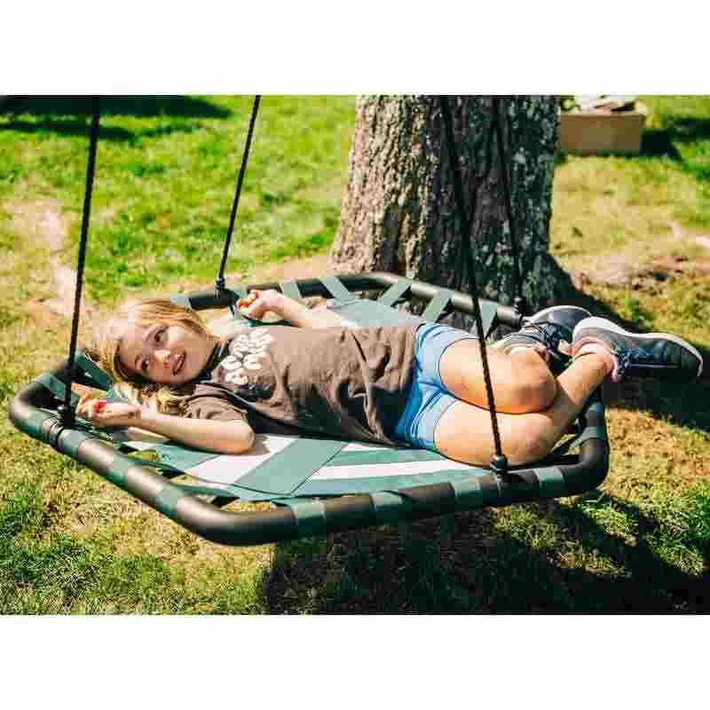 Kids enjoying the Bijou Kubix Swing outdoors