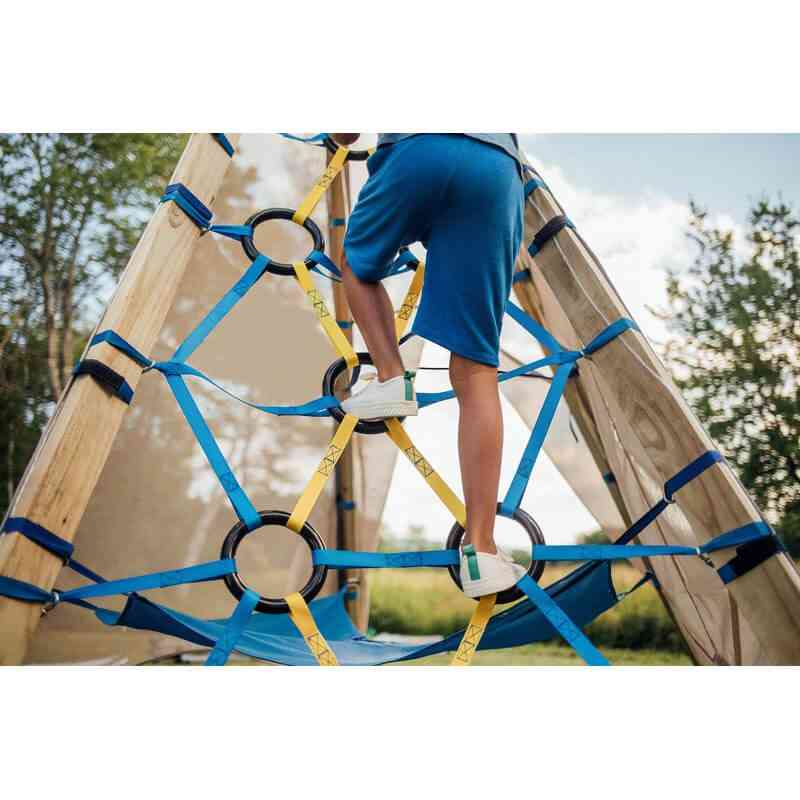 Boy climbing the Bijou Clamber Panel