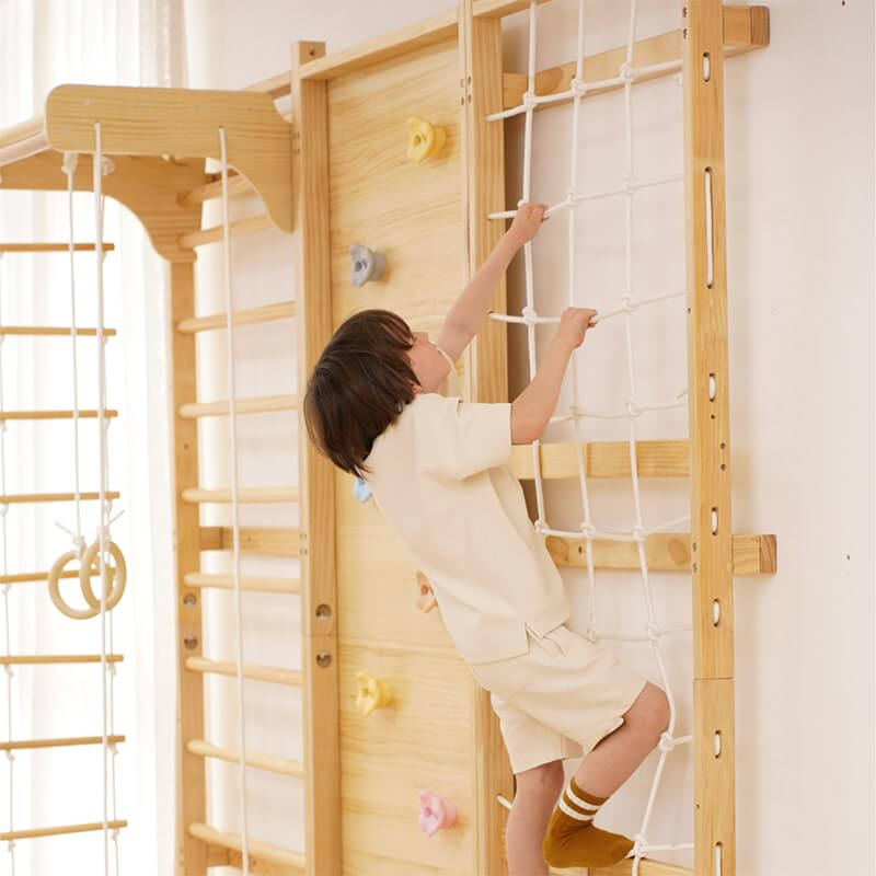 Boy Ascends a Climbing Wall on the Avenlur 9-in-1 Swedish Ladder Gym