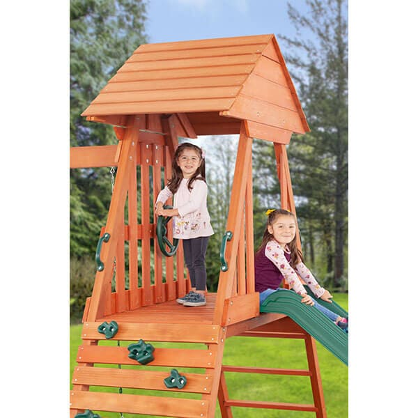 cedar_chalet_wooden_swing_set_kids_playing_on_top_slide
