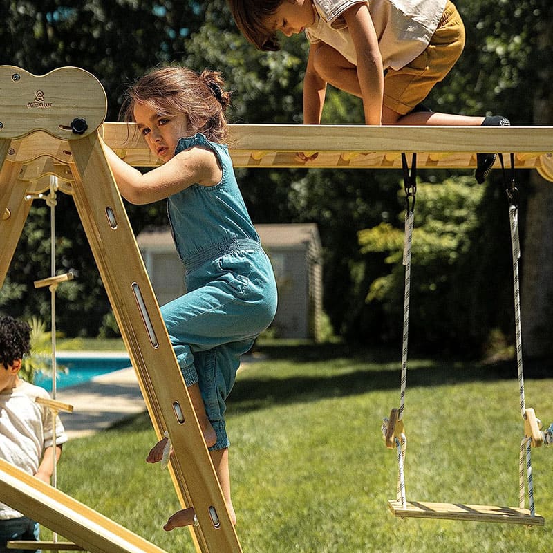 chestnut_outdoor_and_indoor_8_in_1_jungle_gym_for_toddlers_playset_girl_climbing