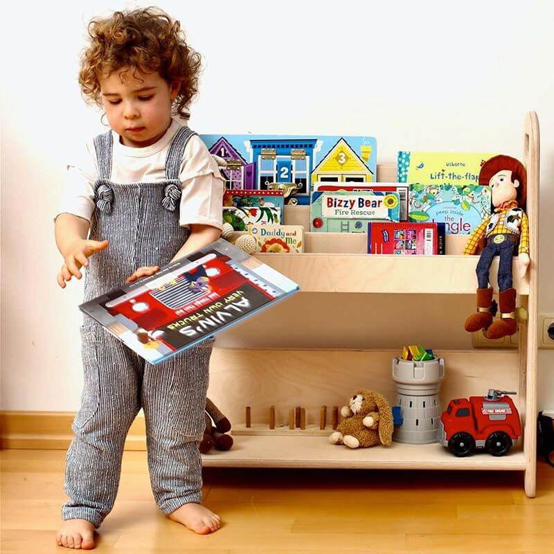 Child Holding a Book in a Room With Kidodido Kids Room Wooden Bookshelf