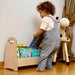 Child Playing With Books in Kidodido Montessori Bookshelf Organizer