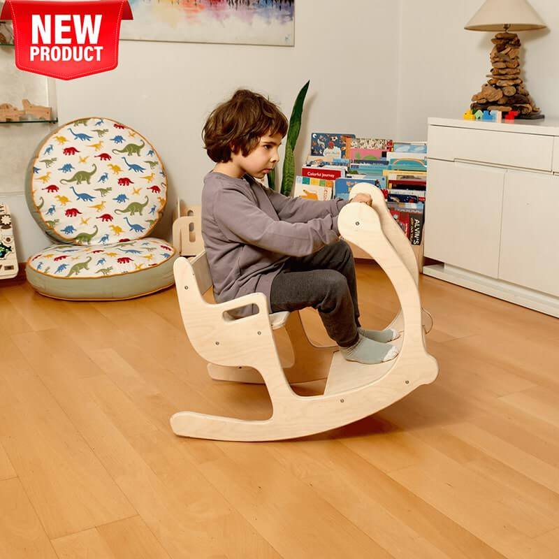 Child Sitting on Kidodido Toddler Rocking Chair and Table Set