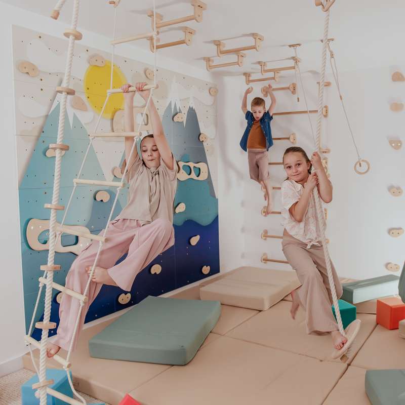 Children's Home Gym – kids on rope activities with an adult nearby
